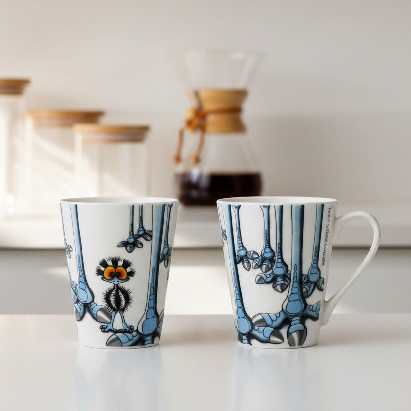Two ceramic mugs with decorative patterns on a white background